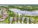 Aerial view of lakefront homes highlighting this home's location and community at 19191 Pease Pl, Lutz, FL 33558
