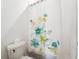 Bathroom displaying a floral shower curtain and a toilet at 19191 Pease Pl, Lutz, FL 33558