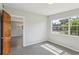 Bright bedroom features a large window, offering bright natural light at 2044 Temple Ter, Clearwater, FL 33764
