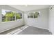 Bright bedroom features two windows, offering lots of natural light at 2044 Temple Ter, Clearwater, FL 33764