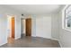 Bright bedroom features a window and a closet, offering ample storage and natural light at 2044 Temple Ter, Clearwater, FL 33764