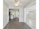 Bright dining area leading to a kitchen with white cabinetry and modern appliances at 2044 Temple Ter, Clearwater, FL 33764