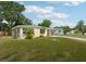 Delightful single-Gathering home with manicured lawn and convenient carport at 2044 Temple Ter, Clearwater, FL 33764