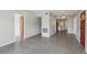 Spacious living room with polished floors and neutral color scheme at 2044 Temple Ter, Clearwater, FL 33764