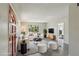 Virtually staged living room with stylish furnishings and ample natural light at 2044 Temple Ter, Clearwater, FL 33764