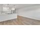 Open-concept kitchen features bright white cabinets, stainless steel appliances, and a modern, stylish design at 216 36Th N Ave # 202B, St Petersburg, FL 33704