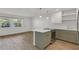 Open concept kitchen featuring stainless steel appliances, and hardwood floors at 216 36Th N Ave # 202B, St Petersburg, FL 33704