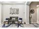 Charming foyer featuring a decorative bench, stylish decor, and an inviting ambiance at 222 Toscavilla Blvd, Nokomis, FL 34275