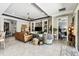 Open floor plan featuring the living area with tile flooring and neutral colors at 222 Toscavilla Blvd, Nokomis, FL 34275