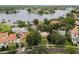 Stunning aerial view of neighborhood homes with tile roofs near the bay and coastline at 2227 Brevard Ne Rd, St Petersburg, FL 33704