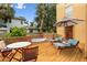 Backyard patio with jacuzzi and outdoor seating, great for entertaining or relaxing at 2227 Brevard Ne Rd, St Petersburg, FL 33704
