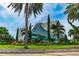 Striking architectural design featuring a glass dome and lush landscaping creates an inviting outdoor space at 2227 Brevard Ne Rd, St Petersburg, FL 33704