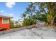 Outdoor terrace with vibrant landscaping and neighborhood views at 2227 Brevard Ne Rd, St Petersburg, FL 33704