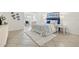 Cozy bedroom featuring a comfortable bed with stylish bedding and a decorative rug at 232 36Th N Ave # 202C, St Petersburg, FL 33704