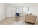 Cozy office space featuring a desk, chair, and comfortable seating area bathed in natural light at 232 36Th N Ave # 202C, St Petersburg, FL 33704