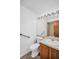 Neutral bathroom featuring grab bars and a standard single sink vanity at 2749 Countryside Blvd # 20, Clearwater, FL 33761