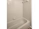 The bathroom features a standard tub with tile walls at 2749 Countryside Blvd # 20, Clearwater, FL 33761