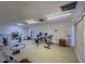 A home gym with exercise equipment, offering a convenient space for workouts and fitness activities at 2749 Countryside Blvd # 20, Clearwater, FL 33761