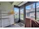 Enclosed lanai featuring screened windows with views of the outdoors at 2749 Countryside Blvd # 20, Clearwater, FL 33761