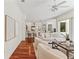 Expansive living room with ample seating, abundant natural light, and open access to the kitchen at 2901 Laurel Meadow Ct, Plant City, FL 33566