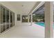 Spacious covered patio overlooking the pool, perfect for outdoor entertaining and relaxation at 2901 Laurel Meadow Ct, Plant City, FL 33566