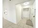 Well-lit entryway with closet and tile flooring at 2935 Lichen Ln # D, Clearwater, FL 33760