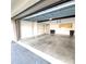 Spacious garage featuring ample storage space, white walls, and a clean concrete floor at 2935 Lichen Ln # D, Clearwater, FL 33760