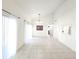 Expansive living and dining area with tile floors, high ceilings, and lots of natural light at 2935 Lichen Ln # D, Clearwater, FL 33760