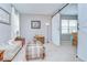 Comfortable living room with carpeted floors, sliding barn door, and stylish furniture at 3012 Magnolia Meadows Dr, Plant City, FL 33567