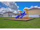 Community playground featuring colorful slides and equipment at 3012 Magnolia Meadows Dr, Plant City, FL 33567