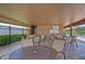 Community pool pavilion with multiple tables, seating, and shade at 3012 Magnolia Meadows Dr, Plant City, FL 33567