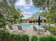 Community pool and lounge area with stylish furniture, perfect for relaxing and enjoying the outdoors at 3062 Eastland Blvd # 405, Clearwater, FL 33761