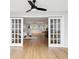 Bright living room and kitchen with hardwood floors and ample seating at 3062 Eastland Blvd # 405, Clearwater, FL 33761