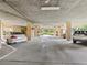 Well lit covered parking garage with reserved spaces for residents, enhancing the community's appeal at 3062 Eastland Blvd # 405, Clearwater, FL 33761