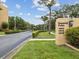 Well-maintained community entrance featuring landscaping and signage for Imperial Pines at 3062 Eastland Blvd # 405, Clearwater, FL 33761