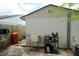 Exterior shot of backyard featuring laundry sink and accessories at 3217 Saddlebrook Ave, Tampa, FL 33618