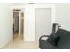 Versatile bonus room featuring a keyboard and a closet with folding doors at 3217 Saddlebrook Ave, Tampa, FL 33618