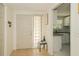 Inviting entryway with tile flooring and a view into the updated kitchen at 3217 Saddlebrook Ave, Tampa, FL 33618