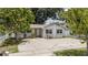 Charming home with a well-manicured front yard and ample parking at 3217 Saddlebrook Ave, Tampa, FL 33618