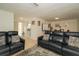 Comfortable living room with neutral decor and a view of the kitchen and dining area at 3217 Saddlebrook Ave, Tampa, FL 33618