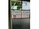 Balcony with railings and view of the street at 3802 N Oak Dr # W22, Tampa, FL 33611