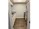 Bright kitchen featuring white cabinets, stainless steel appliances, and modern flooring at 3802 N Oak Dr # W22, Tampa, FL 33611