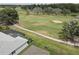 Aerial shot of property backing to the golf course, and pool area at 3813 Salida Delsol Dr, Ruskin, FL 33573