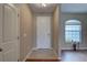 Entryway featuring tile flooring and natural light at 3813 Salida Delsol Dr, Ruskin, FL 33573