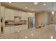 Well-equipped kitchen with granite countertops, stainless steel appliances, tile backsplash, and ample cabinet space at 3813 Salida Delsol Dr, Ruskin, FL 33573