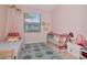 Charming bedroom with whimsical decor, perfect for a retreat at 3821 Turkey Oak Dr, Valrico, FL 33596