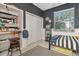 bedroom with a comfortable bed, natural light, closet space, and stylish decor at 3821 Turkey Oak Dr, Valrico, FL 33596