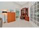 Inviting home office space featuring built-in desk, cabinetry, and plenty of natural light at 3821 Turkey Oak Dr, Valrico, FL 33596