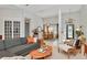 Open-concept living space with stylish furnishings, a dining area, and plenty of natural light at 3821 Turkey Oak Dr, Valrico, FL 33596