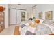Comfortable main bedroom with backyard views, sliding barn door, and ample natural light at 3821 Turkey Oak Dr, Valrico, FL 33596